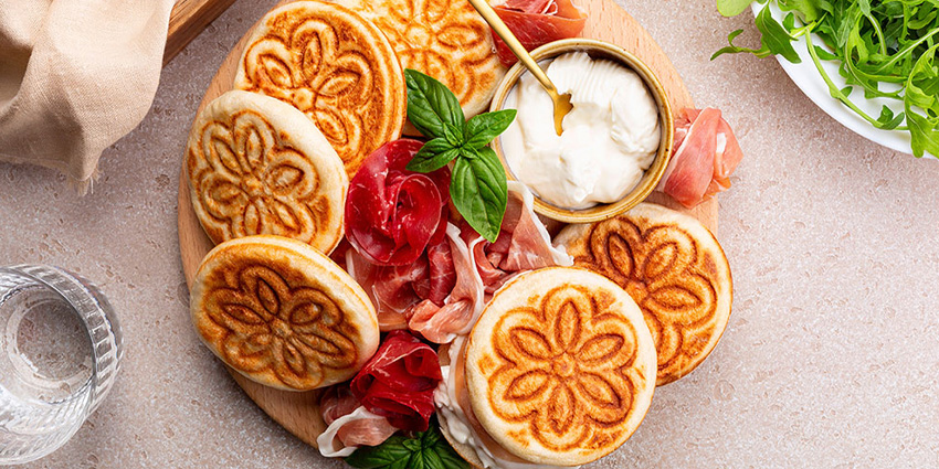Discovering Tigelle Emiliane: A Taste of Authentic Emilia-Romagna